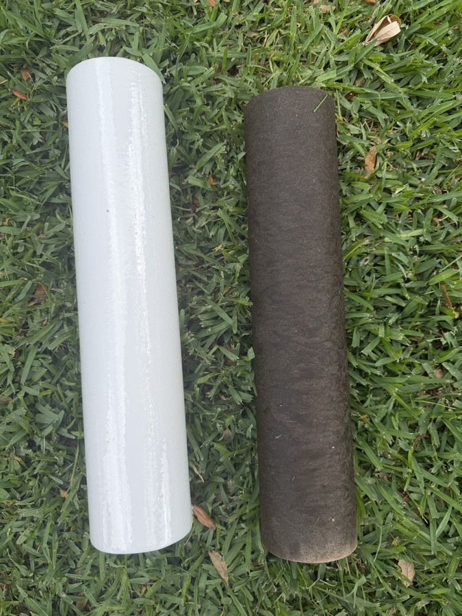 Two water filter cartridges side by side: a clean white new filter, and a used one stained dark brown from six months of Houston water.